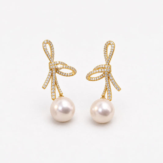 Pearl Earrings with Shiny Bow in Gold