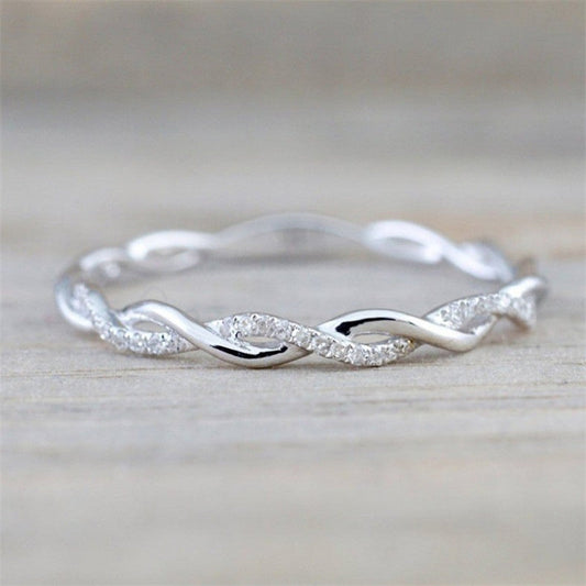 Braided Ring with Zircons in Gold and Silver